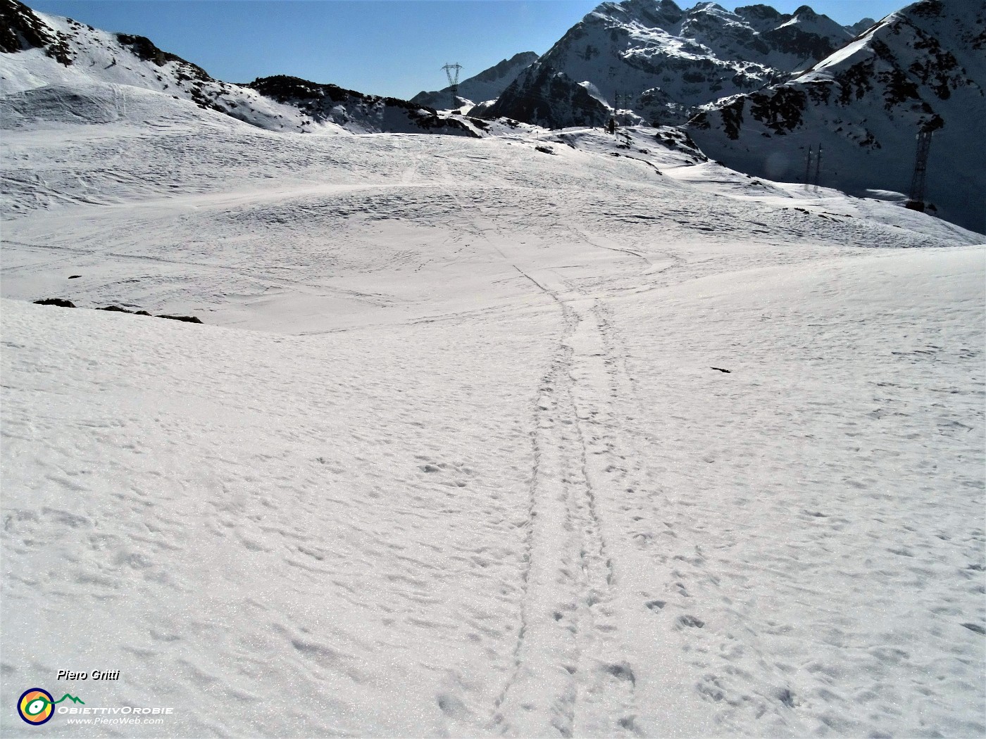 53 Rientro al Passo San Marco con affondi nella neve rammollita dal sole.JPG -                                